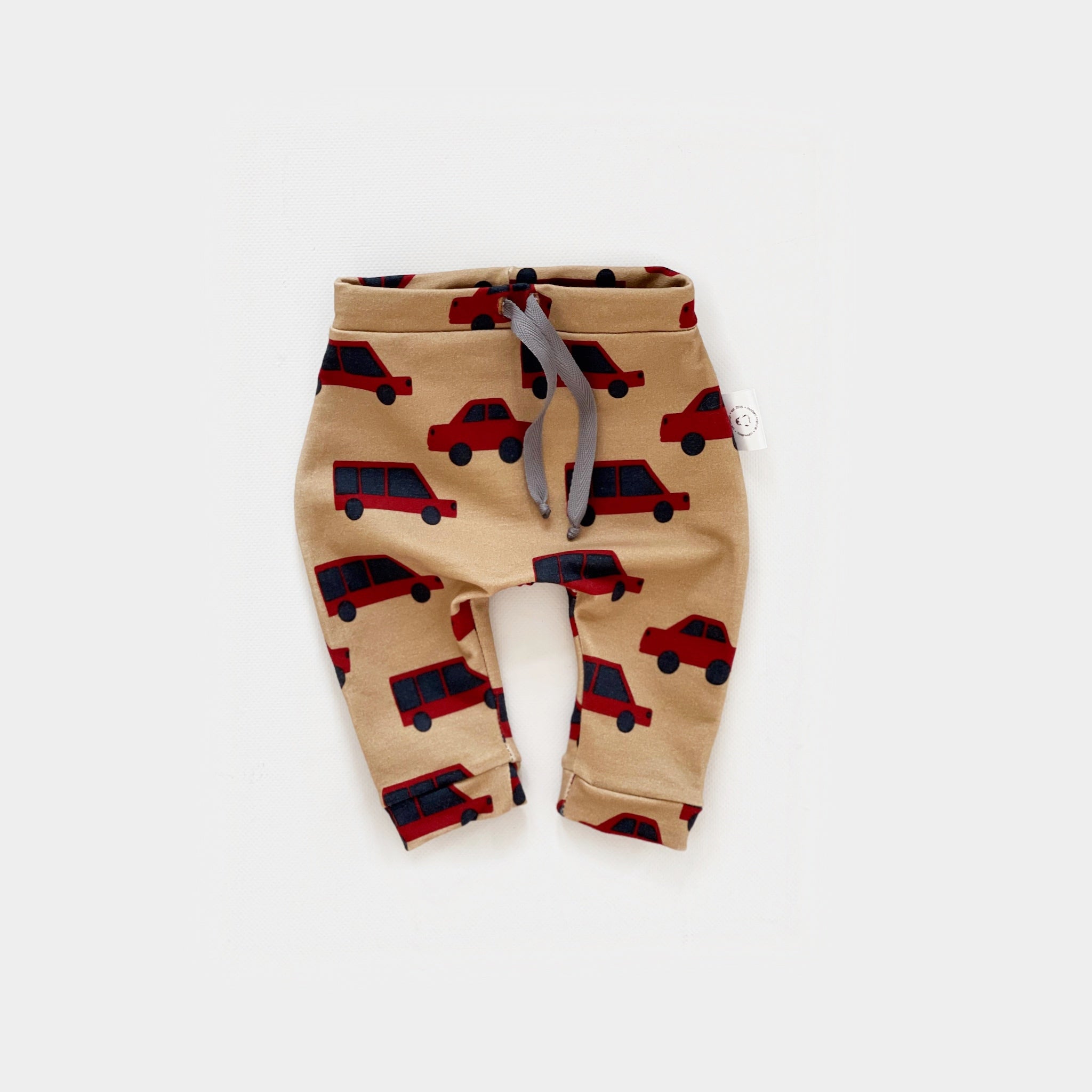 Trousers with Cars on Sand