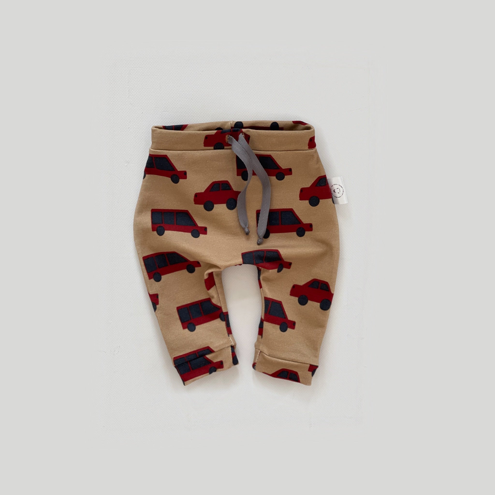 Trousers with Cars on Sand